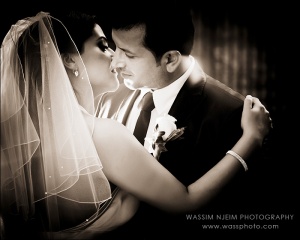 Bride and Groom kissing sepia cinematic