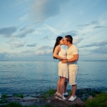 Couple kissing at the sunset