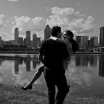 Dancing couple with Montreal scenic view