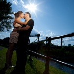 Couple kissing under the sun