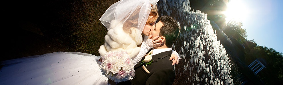 Couple kissing at sunset