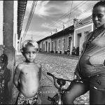Photograph of a mother and her child on the streets of Trinidad Cuba